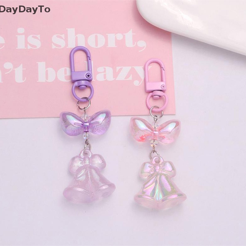 Vỏ Bọc Tai Nghe / Móc Khóa Hình Nơ Bằng Acrylic Màu Dạ Quang Xinh Xắn