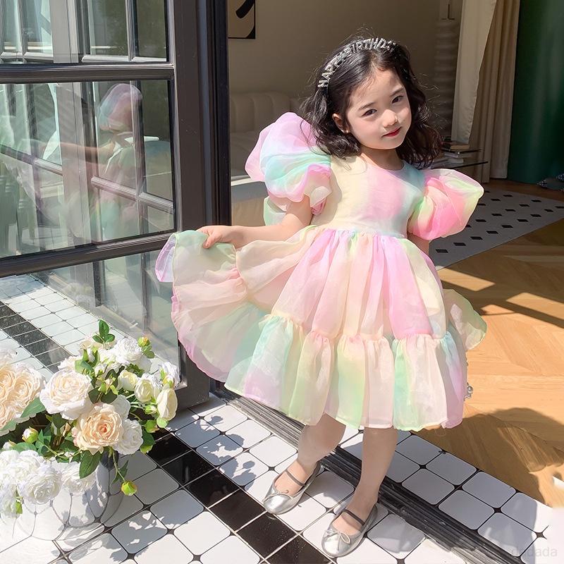 Đầm Công Chúa Phối Lưới Tay Phồng Đính Nơ Màu Cầu Vồng Thời Trang Mùa Hè Cho Bé Gái