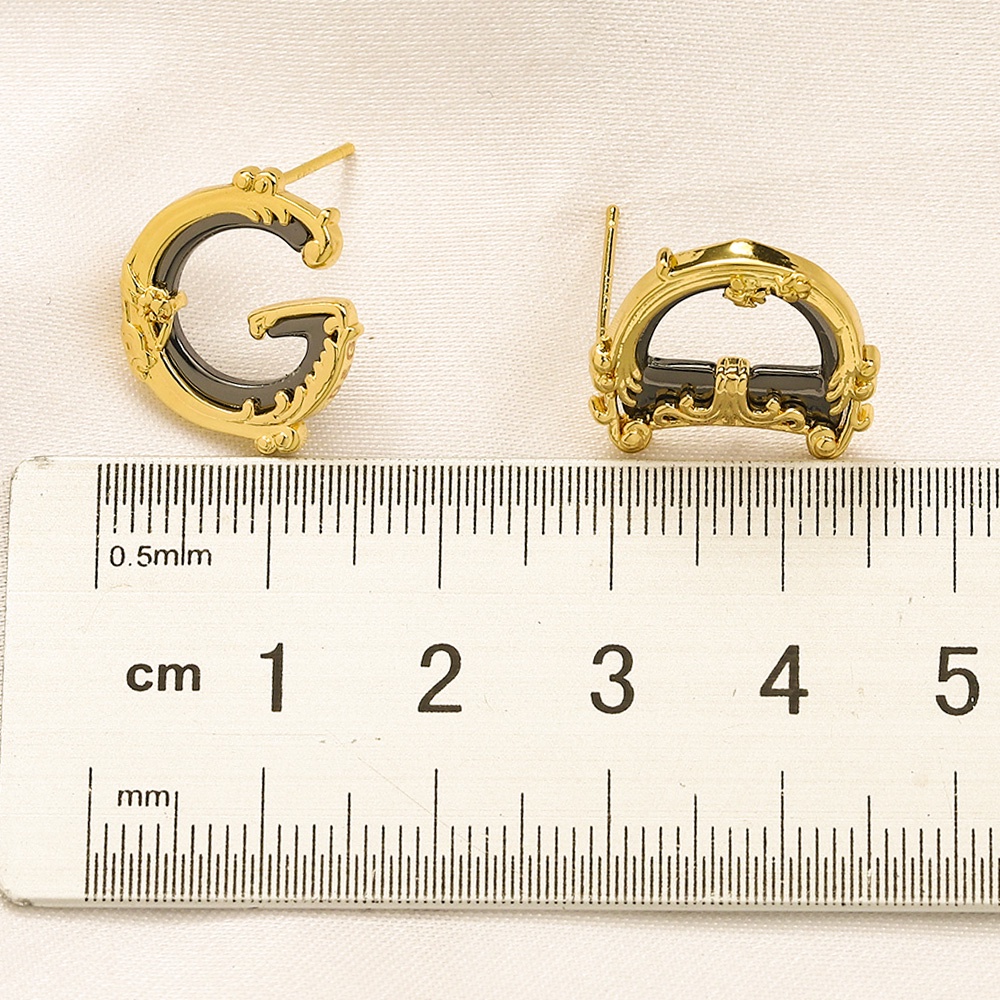 Khuyên Tai Tròn Khắc Chữ Dolce Gabbana Bằng Thép Titan Thời Trang Cho Nữ