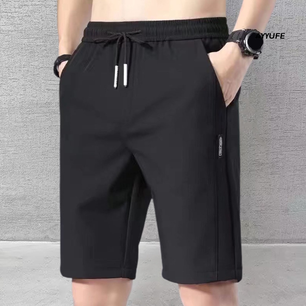 [AYYUFE] Quần Short Dây Rút Co Giãn Màu Trơn Ống Rộng Dài Đến Đầu Gối Có Túi Dành Cho Nam Chạy Bộ Tập Thể Dục