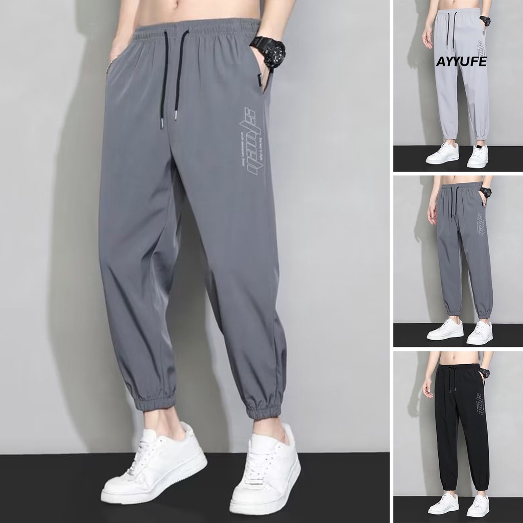 [AYYUFE] Quần Thể Thao Dây Rút Co Giãn Lưng Vừa In Chữ Bằng Lụa Lạnh Mỏng Có Túi Dành Cho Nam Chạy Bộ