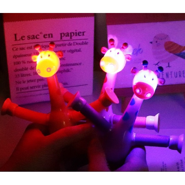 Đồ chơi Hươu nhún cao cổ kéo dài rút dính phát sáng nhiều màu sắc, Hươu cao cổ lò xo cho bé