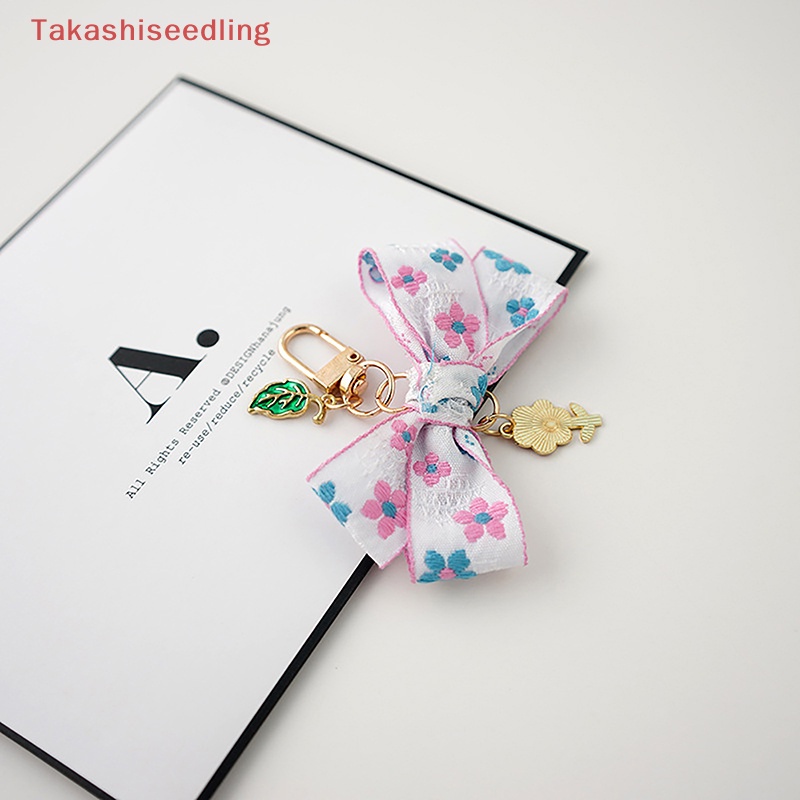 1 Móc Khóa Hình Hoa Hướng Dương Thắt Nơ Xinh Xắn