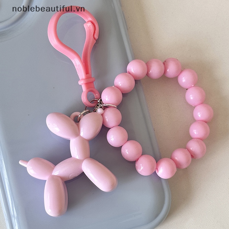 1 Móc Khóa Hình Chú Chó Đeo Bong Bóng Ngọc Trai Dễ Thương