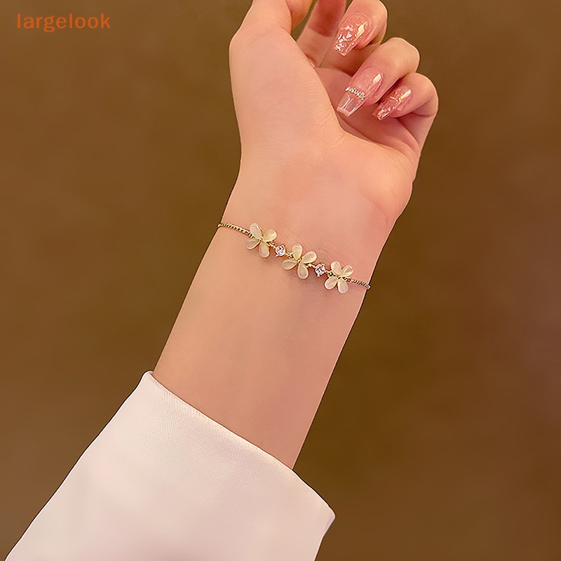 Vòng Đeo Tay Hình Hoa Màu Vàng Đính Đá Opal Thời Trang Dành Cho Nữ