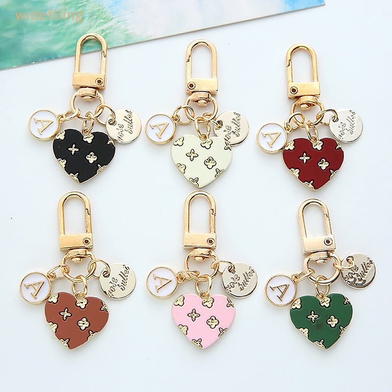 Móc Khóa Kim Loại Mặt Tròn In Chữ Thời Trang Dành Cho Tai Nghe / Túi Xách