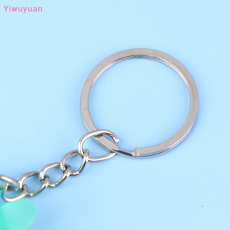 1 Móc Khóa Hình Búp Bê Hoạt Hình Phát Sáng Dễ Thương