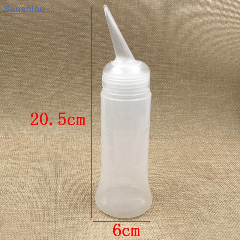 Chai Nhựa Trong Suốt Có Thước Đo Dùng Để Làm Tóc Trong Salon