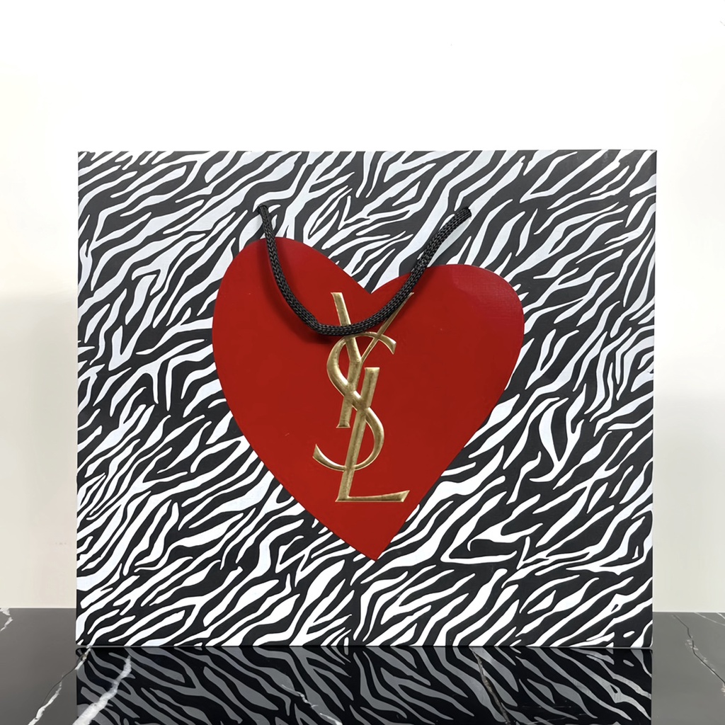 Ysl qixi limit noctilucent zebra lipstick flawless makeup powder cushion hộp quà