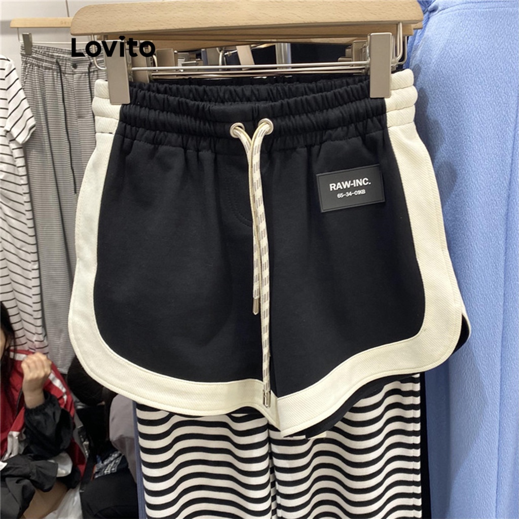 Quần short Lovito cạp vừa họa tiết chữ dây rút tương phản phong cách thường ngày cho nữ LNE12135