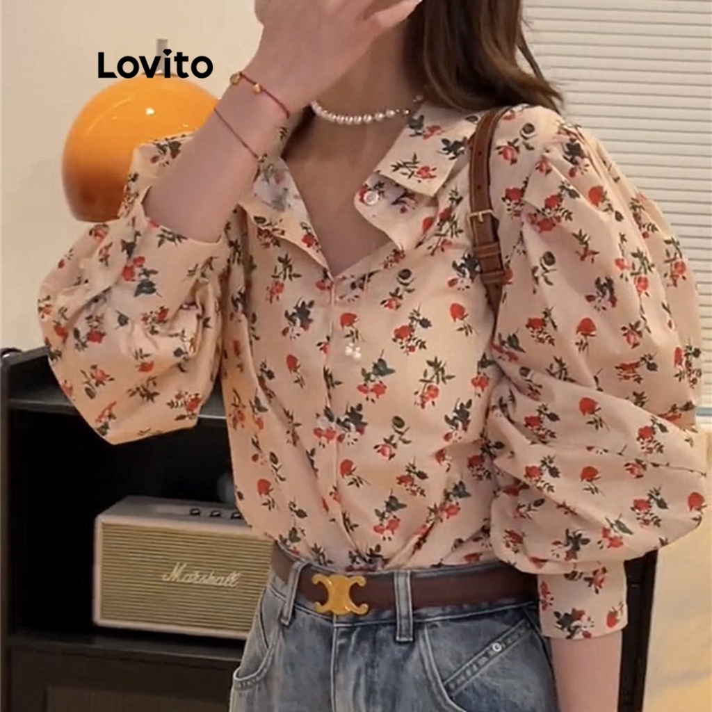 Áo kiểu Lovito tay phồng dài bo thun cổ tay phối nút phía trước họa tiết hoa thanh lịch cho nữ LNE05101 (trắng ngà)