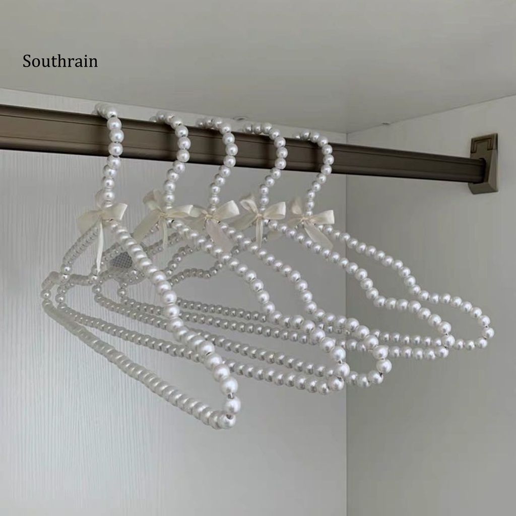 Set 2 Móc Treo Quần Áo Đính Nơ Và Ngọc Trai Nhân Tạo Bằng Nhựa Tiện Lợi