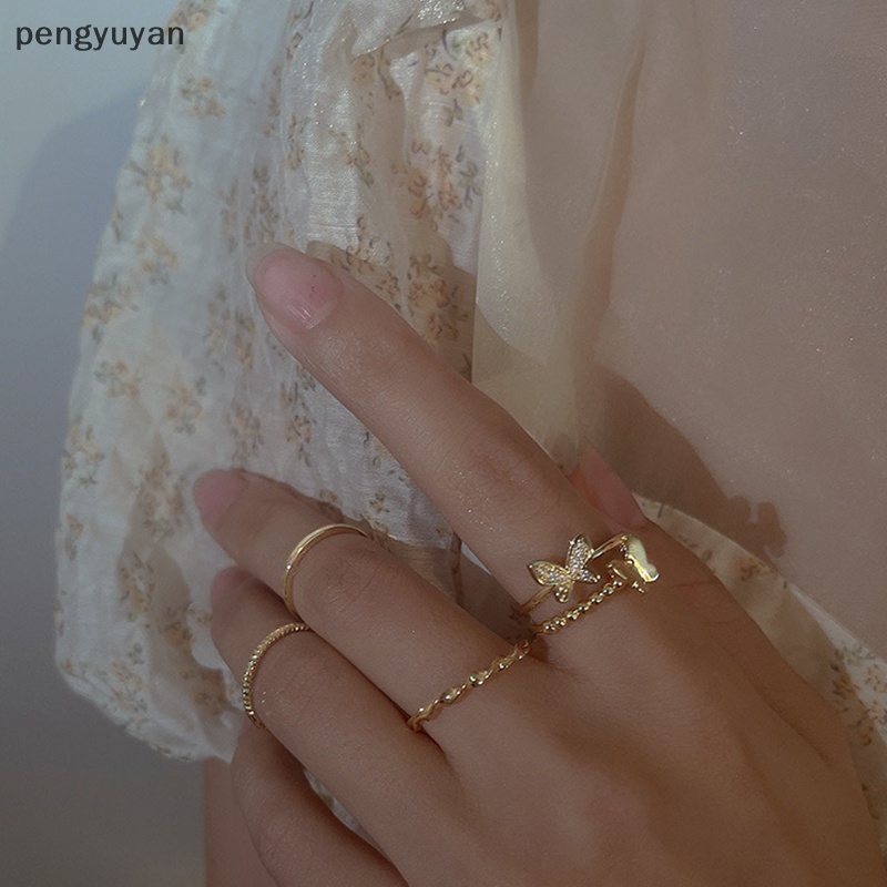 Bộ 4 Nhẫn Hình Tròn Họa Tiết Bướm Màu Bạc Thời Trang Có Thể Điều Chỉnh Cho Nữ
