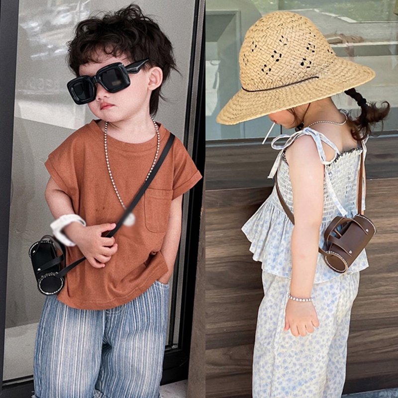 Túi trẻ em phong cách mới thời trang túi xách retro thời trang cô gái đơn giản túi messenger trẻ em ví tiền xu bằng da