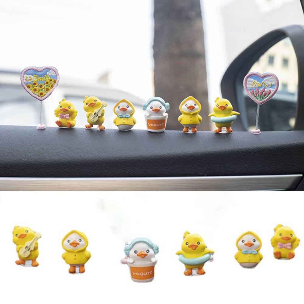 .Đồ trang trí Chú Vịt Mini Điêu Khắc Trang Trí Nội Thất Xe Hơi