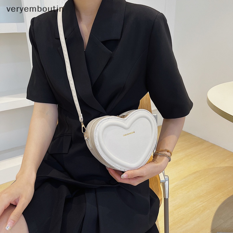 Túi Đeo Chéo Da PU Màu Trơn Hình Trái Tim Thời Trang Cho Nữ