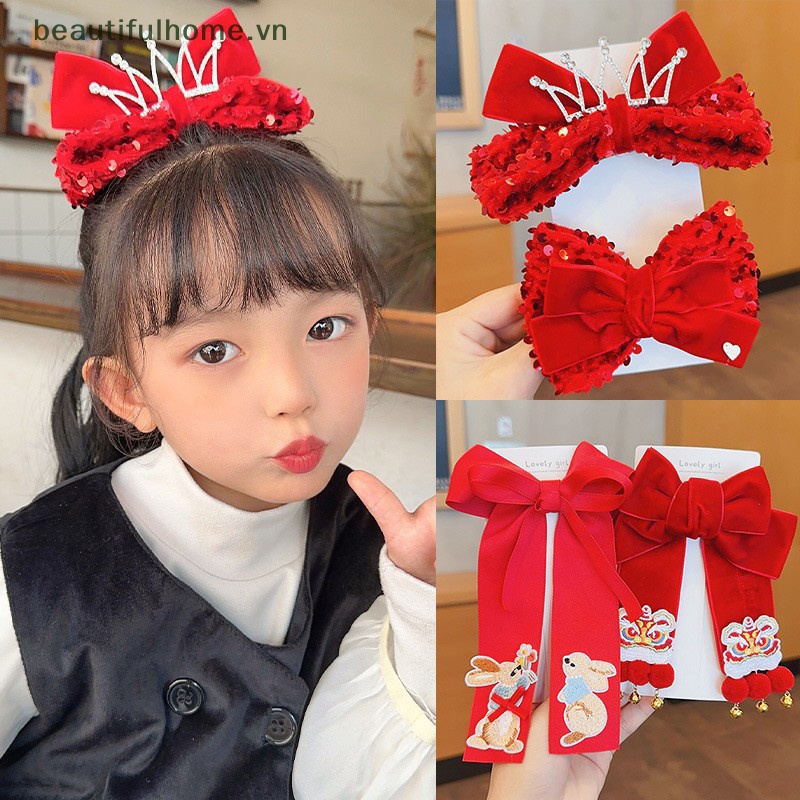 Kẹp Tóc Nơ Tua Rua Cho Bé Gái Màu Đỏ Mừng Năm Mới