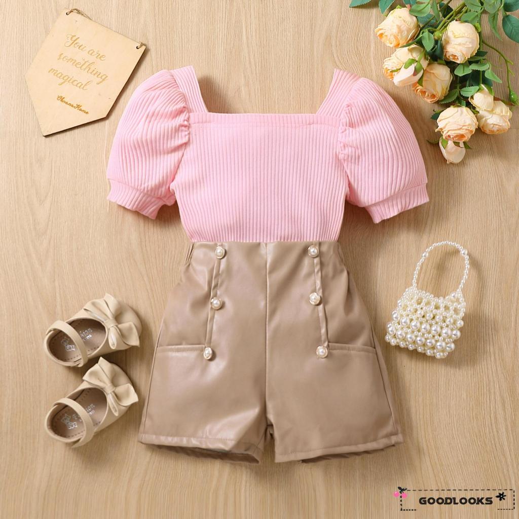 Bộ Áo Đan Len Tay Ngắn Màu Hồng + Quần Short Cài Nút Nâu Thời Trang Mùa Hè Cho Bé Gái