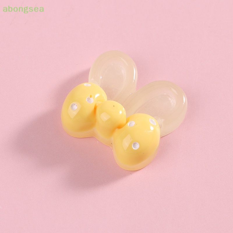 Set 10 Phụ Kiện Trang Trí Ốp Điện Thoại Hình Tai Thỏ Bằng Nhựa Kích Thước 21 * 19mm