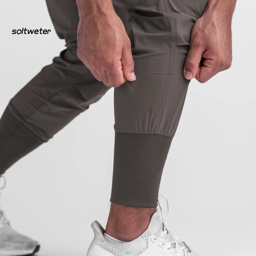 Quần Dài Thể Thao Màu Trơn Mau Khô Nhiều Túi Lưng Thun Co Giãn Dành Cho Nam