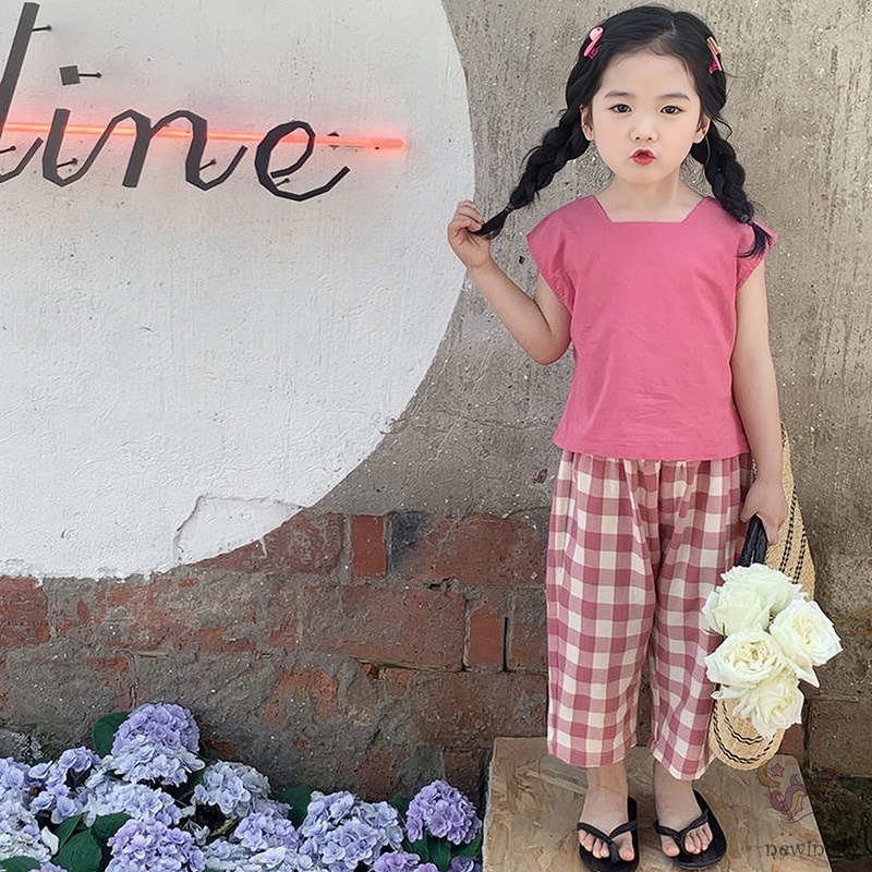 Set Đồ Mùa Hè 2 Món Gồm Áo Cổ Vuông Hở Lưng Màu Trơn + Quần Dài Eo Thun Kẻ Sọc Caro Cho Bé Gái