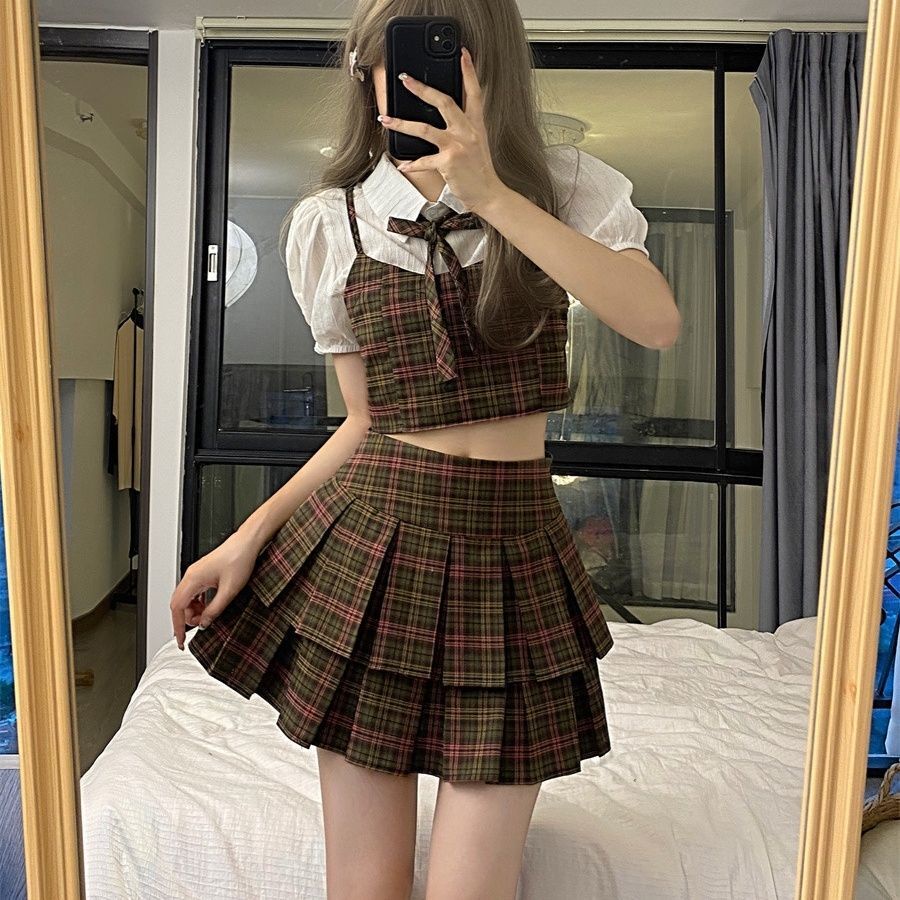 Bộ đồng phục jk phong cách đại học phù hợp với mùa hè của phụ nữ áo sơ mi kẻ sọc ngắn tay phồng váy xếp li eo cao bộ