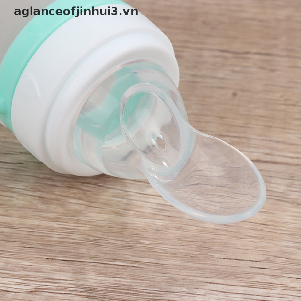 Bình Ăn Dặm Bằng Silicone Hình Cá Heo Kèm Muỗng Tiện Dụng Cho Bé