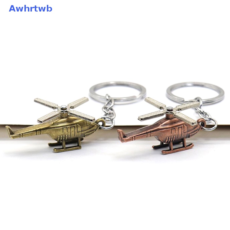 Móc Chìa Khóa Xe Hơi / Túi Xách Hình Chiếc Lá Xoắn Ốc Bằng Đồng Phong Cách Retro Mới