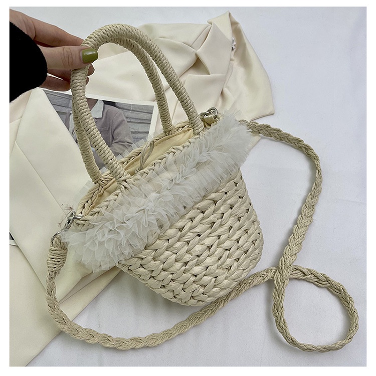 New minimalist straw resort casual niche hand-held cross-body bag
