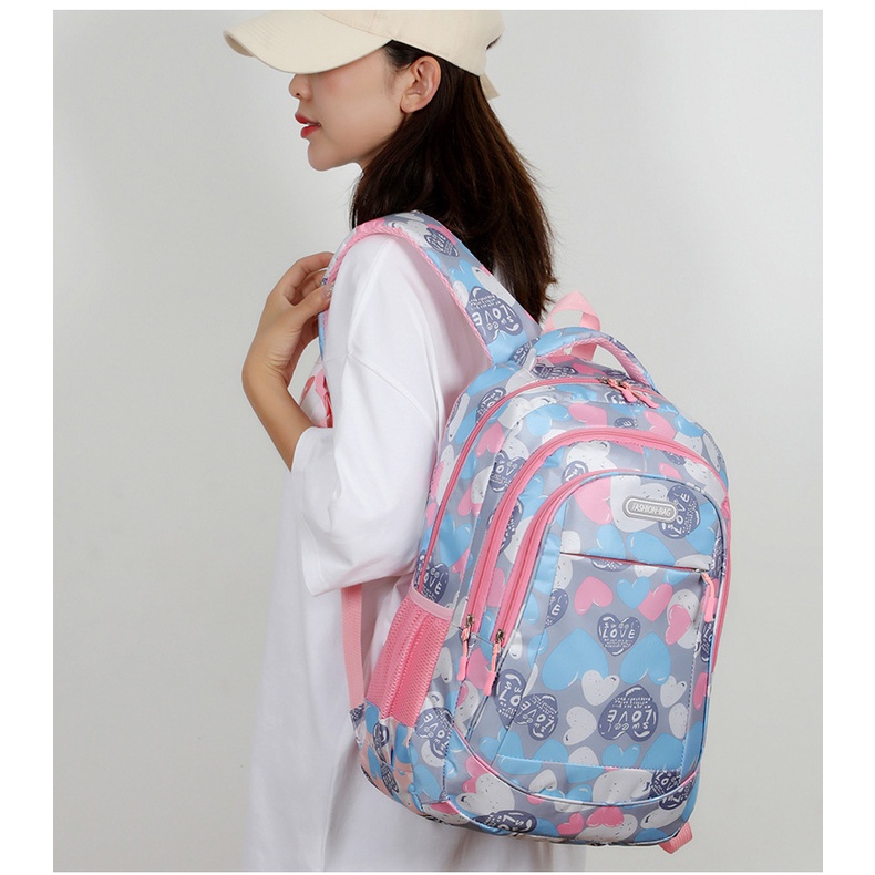 Ba Lô Đi Học In Họa Tiết Trái Tim Xinh Xắn Dành Cho Bé Lớp 1-6