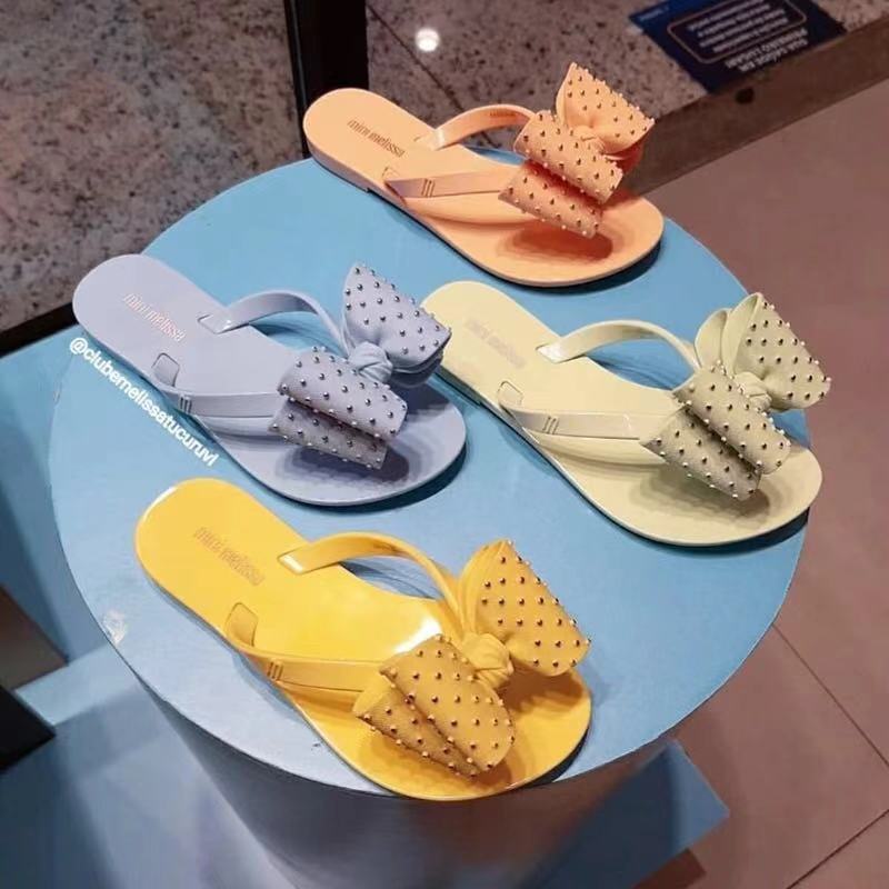 Sandal Đi Biển Mùa Hè Phong Cách Melissa Đế Phẳng Đính Nơ Phong Cách Hàn Quốc Cho Nữ