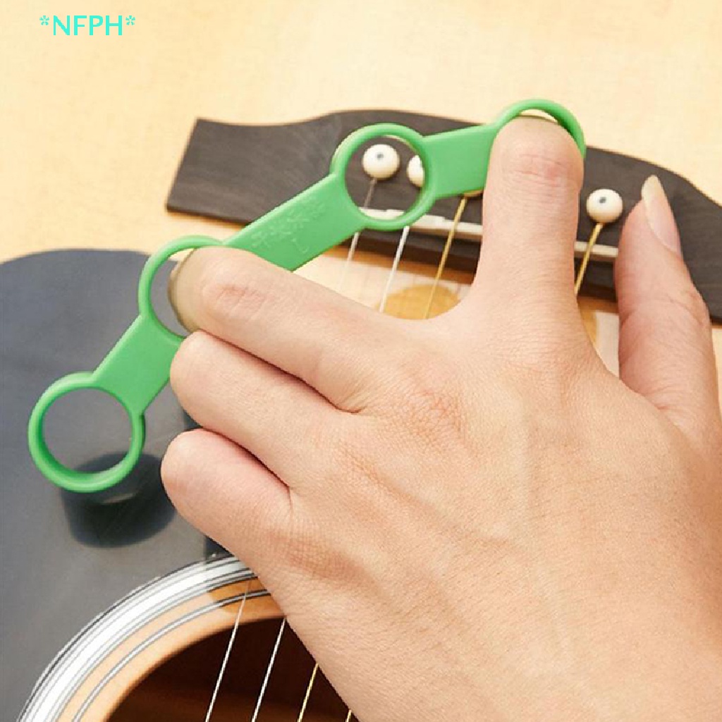 Nfph &gt; Dụng Cụ Nối Dài Ngón Tay Bằng Nhựa Hỗ Trợ Chơi Đàn Guitar Mới