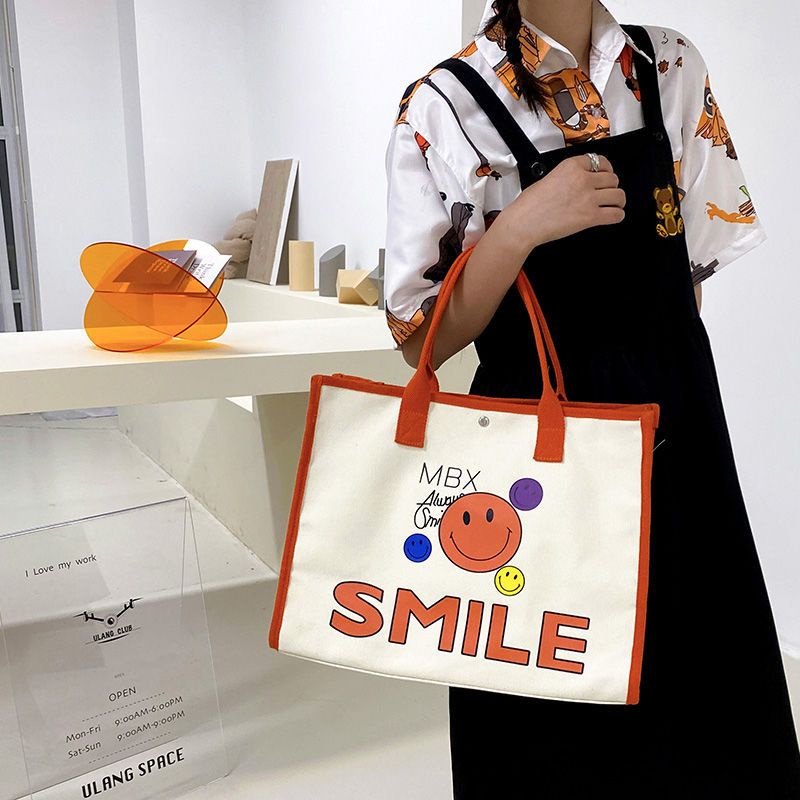 Túi Tote Đeo Vai Mùa Hè 2023 Bằng Vải Bạt In Họa Tiết Mặt Cười Phong Cách Mới Dễ Phối Đồ Cho Nữ