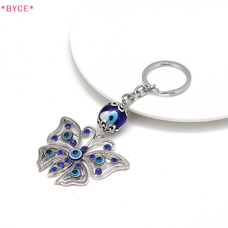 Móc Khóa Hình Bướm Đính Đá Mắt Xanh Bằng Hợp Kim Thời Trang Cho Nam Và Nữ Mới