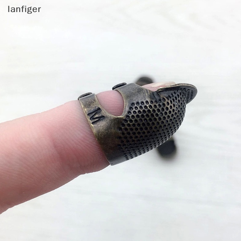 Dụng Cụ Bảo Vệ Ngón Tay Khi May Vá Bằng Kim Loại Màu Vàng