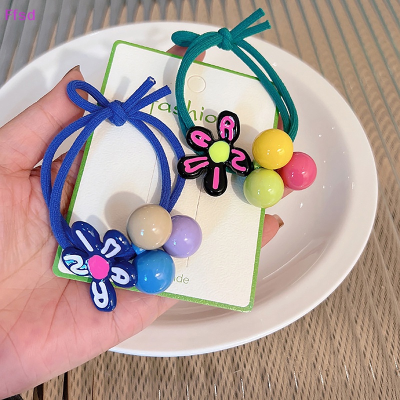 Dây Cột Tóc Co Giãn Hình Bông Hoa Màu Sắc Đáng Yêu Thời Trang Cho Bé Gái