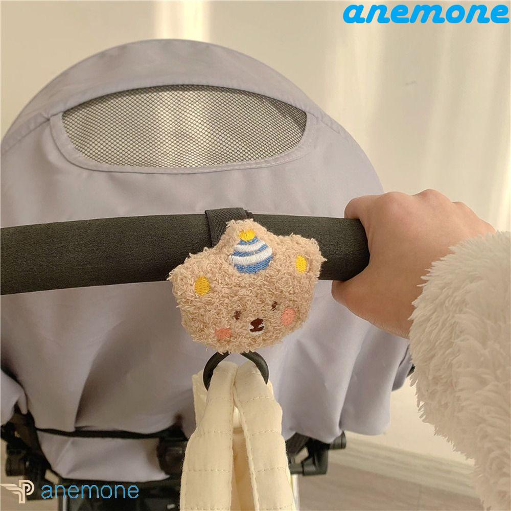 Móc Treo Đồ Gắn Xe Đẩy Em Bé Bằng Vải Bông Thêu Hình Dễ Thương Chống Trượt