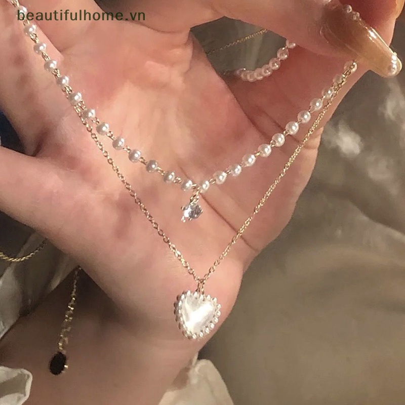 Vòng cổ Mặt Hình Trái Tim Đính Ngọc Trai Lấp Lánh Thời Trang Cho Nữ