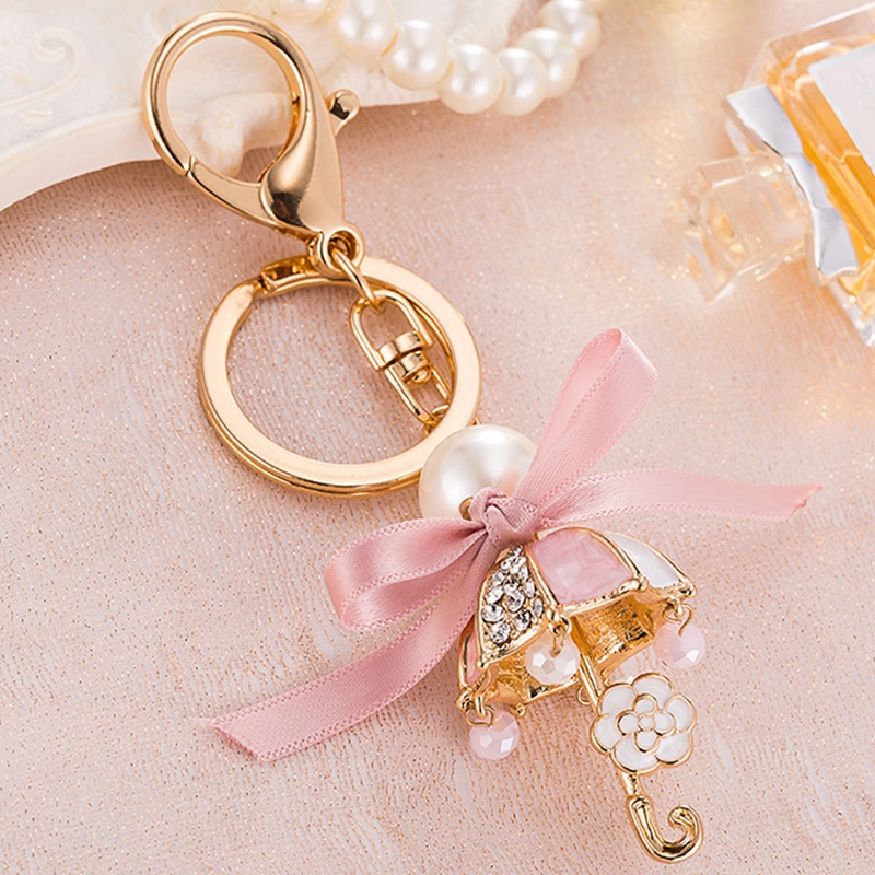 Móc Khóa Hình Nơ Thắt Ruy Băng Màu Hồng Bằng Hợp Kim Thời Trang Cho Nữ