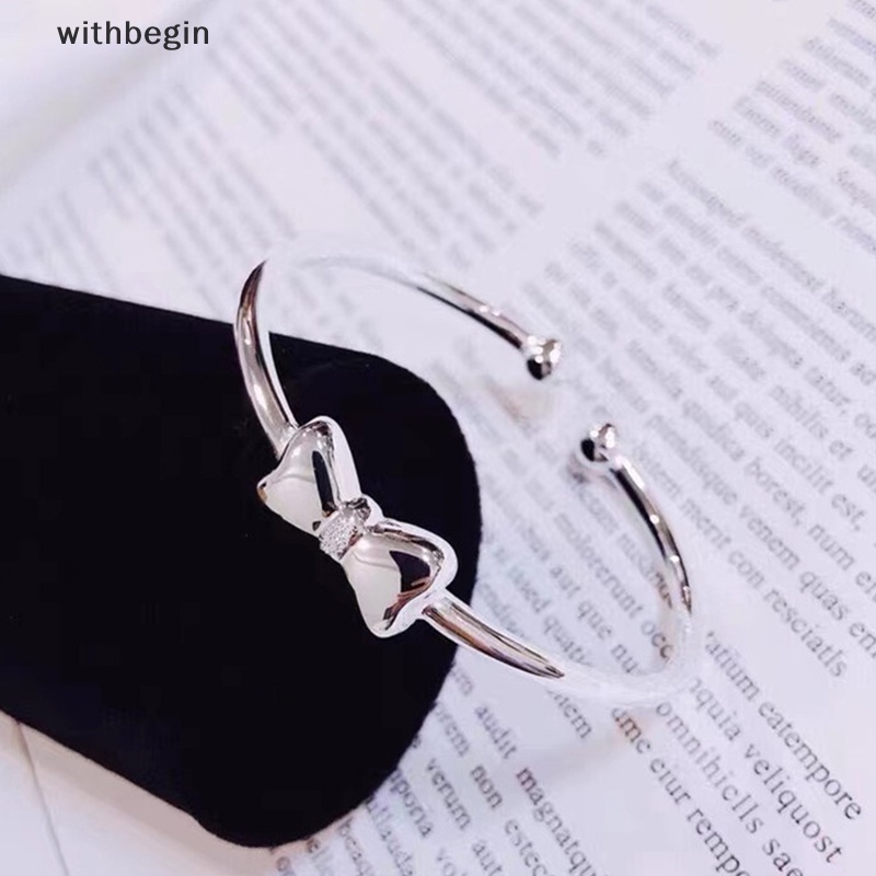 Vòng Đeo Tay Dạng Hở Màu Bạc Điều Chỉnh Được Phối Nơ Thời Trang Cho Nữ