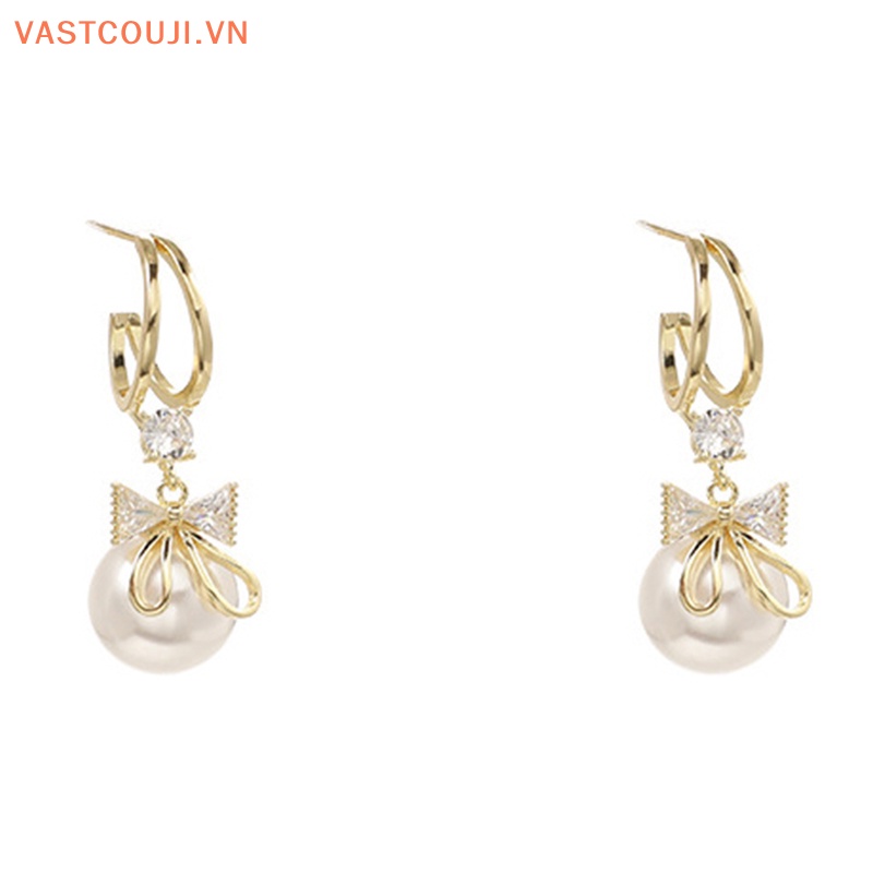 Khuyên Tai Hình Nơ Đính Ngọc Trai Nhân Tạo Phối Tua Rua Thời Trang