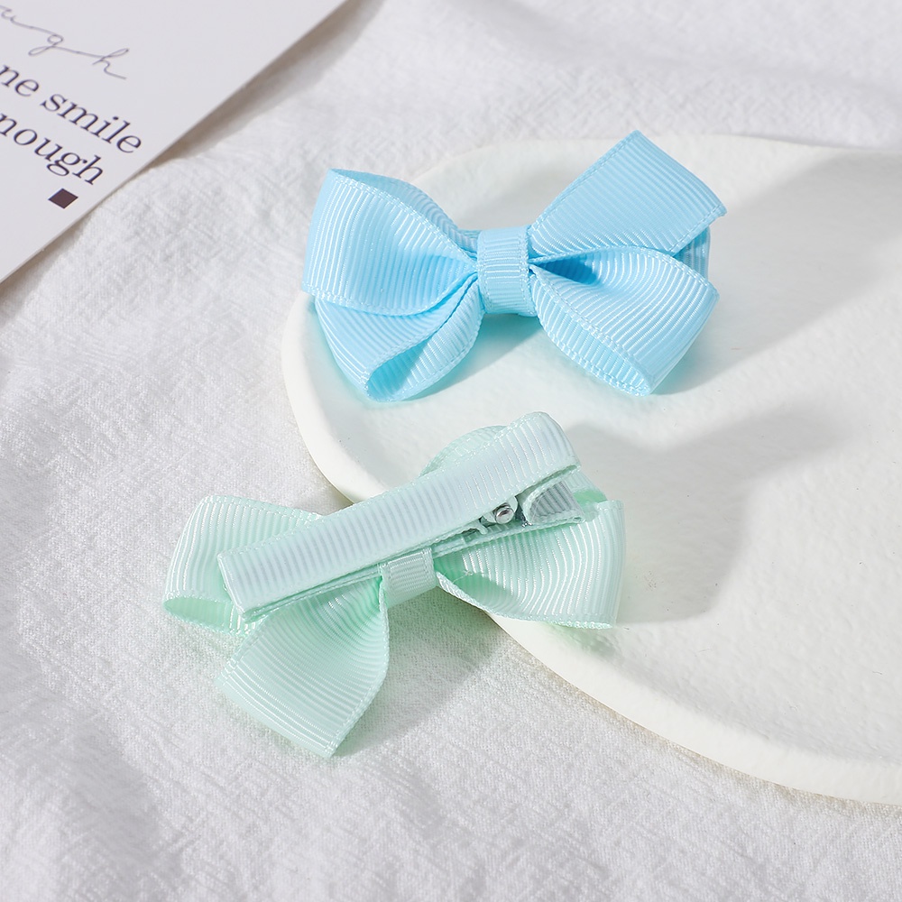 Set 2 Kẹp Tóc Nơ Màu Kẹo Ngọt Thời Trang Cho Bé Gái