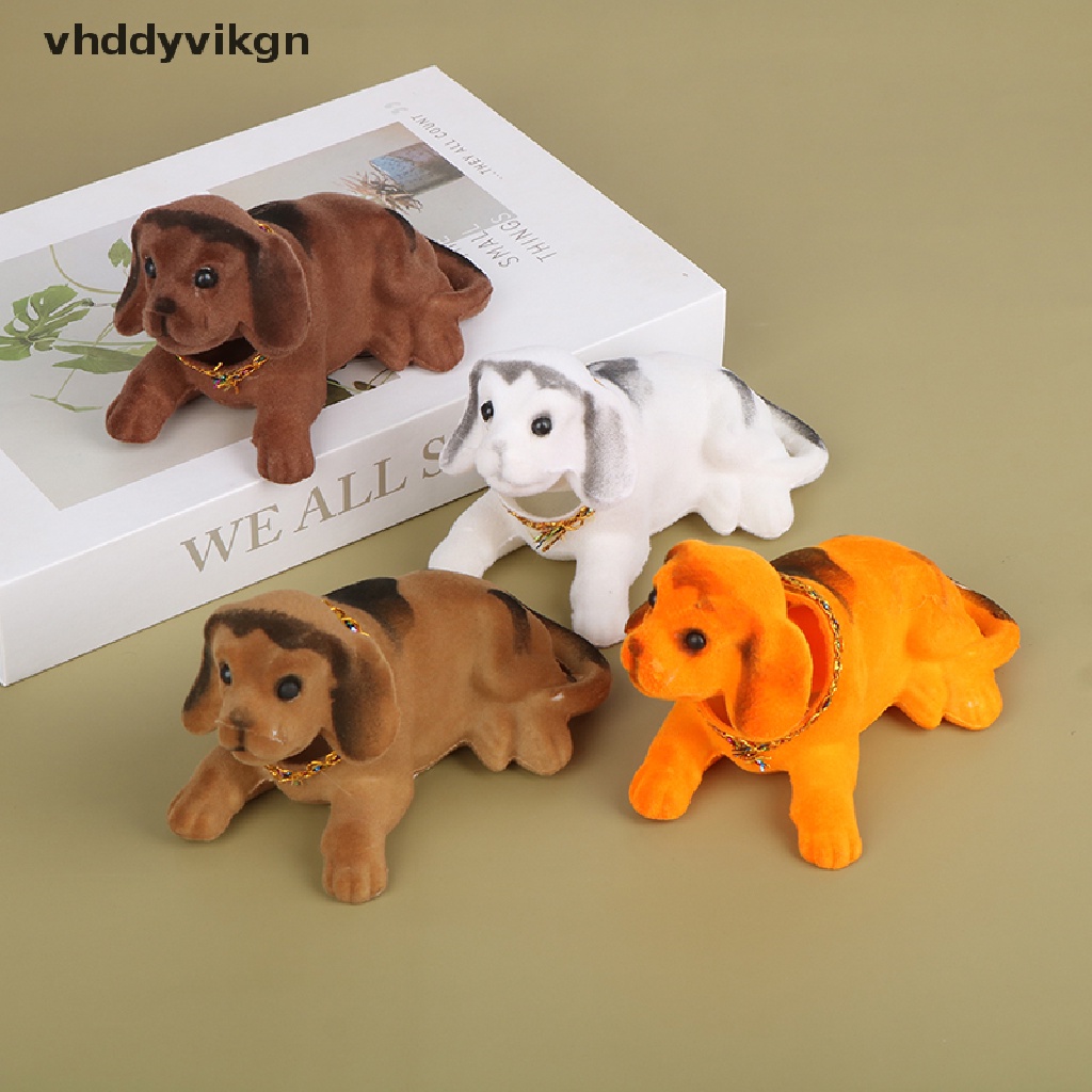 Đồ Chơi Chú Chó Lắc Đầu Trang Trí Bảng Điều Khiển Xe Hơi