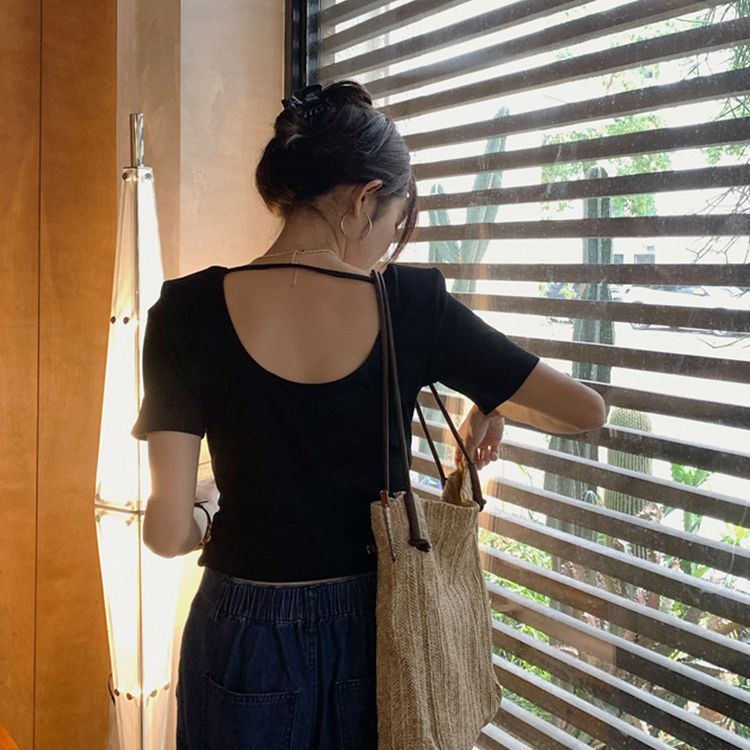 【WANG JIAO ZHAN】 Áo crop top nữ Phiên bản Hàn Quốc của áo phông ngắn tay ôm sát và áo ngắn hở lưng thon gọn【9979】