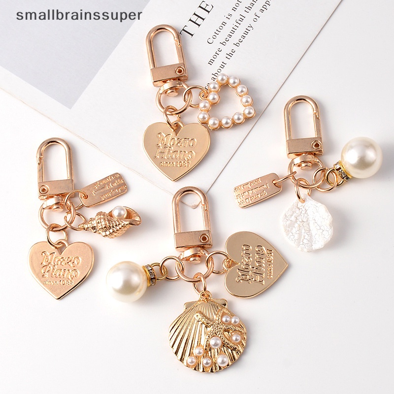 Móc Khóa Hình Vỏ Sò Đính Ngọc Trai Thời Trang Dành Cho Nữ SBS