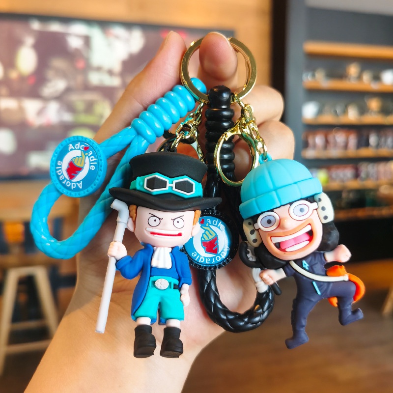 New one piece key ring charm key ring luffy ace cartoon charm dễ thương sáng tạo túi đi học móc chìa khóa món quà nhỏ bán buôn quà tặng sinh nhật món quà nhỏ