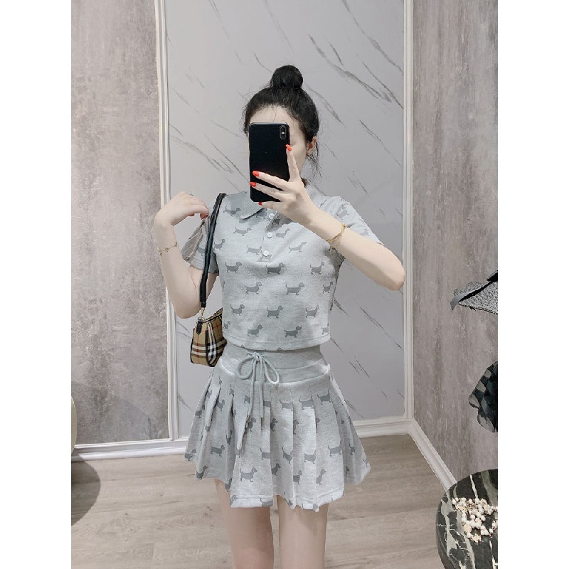 New Internet celebrity fashion folding collar polo shirt pleated skirt two-piece set small casual temperament short-sleeved T-shirt A- line skirt casual sports suit