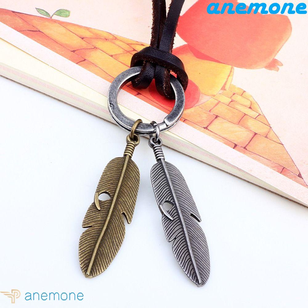 Vòng cổ Da Mặt Tròn Đính Cánh Thiên Thần Và Lông Vũ Phong Cách Cổ Điển Độc Đáo Cho Nam