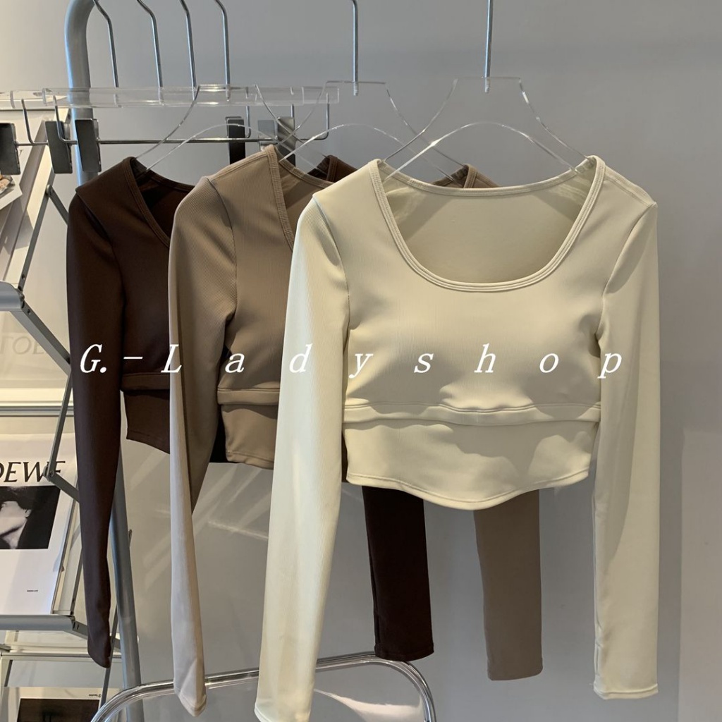 Áo Thun Thể Thao Yoga Tay Dài Màu Trà Sữa Nhạt Phong Cách Âu Mỹ Có Đệm Ngực