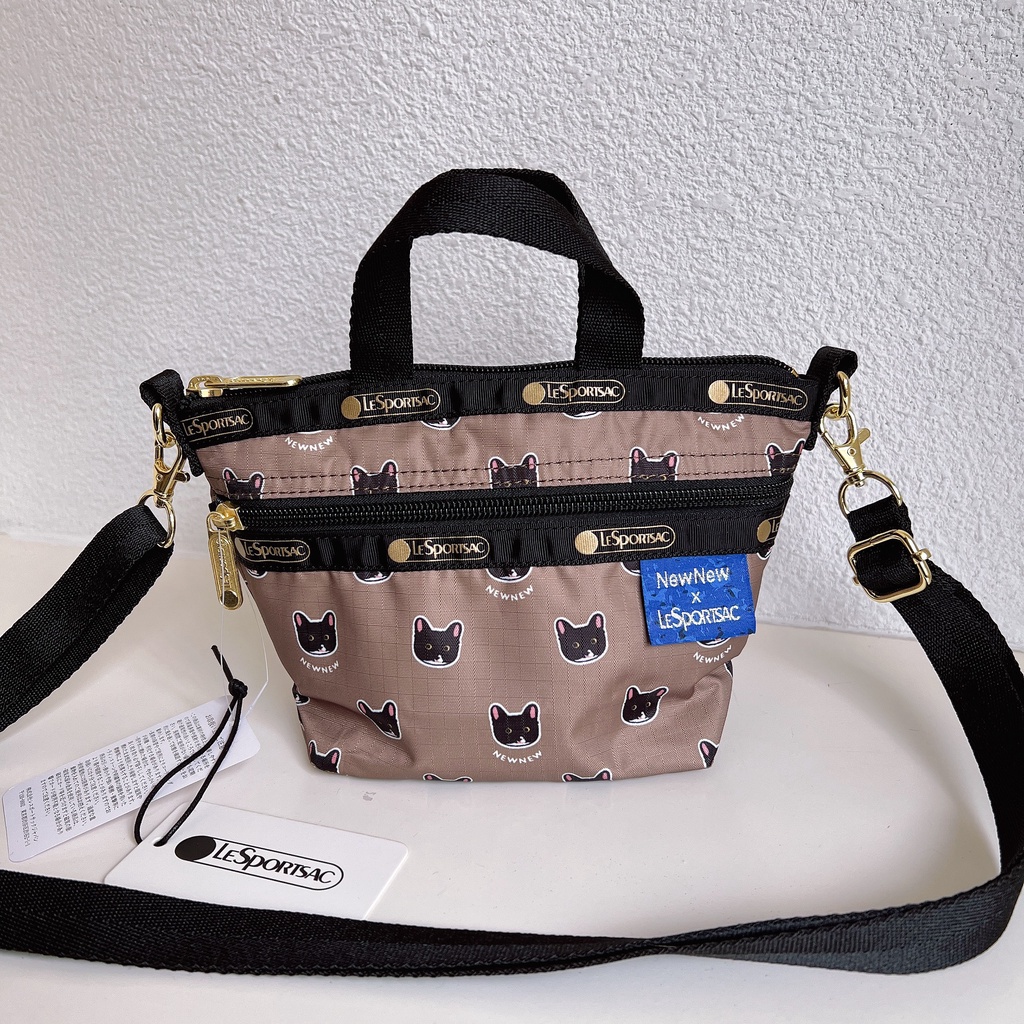 Túi Xách Lesportsac 3785 Kích Thước 13x23cm Họa Tiết Thế Giới Vui Nhộn Niu Niu